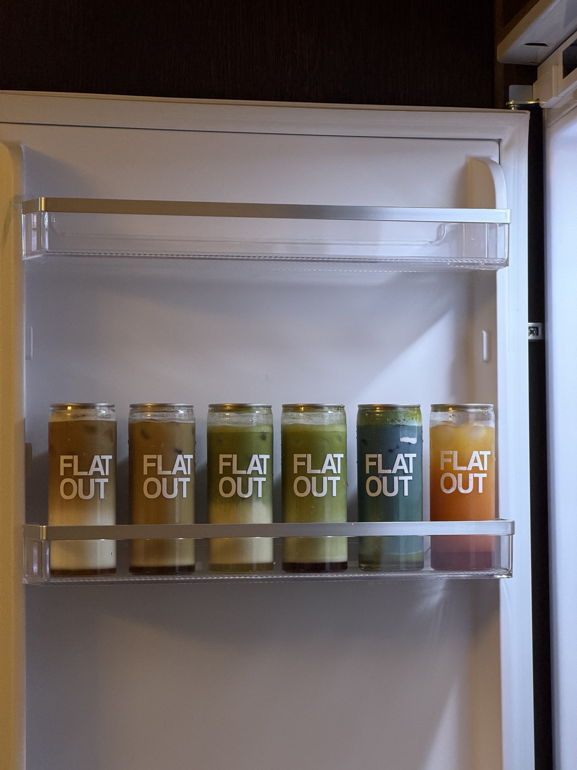 A fridge stocked with Flat Out drinks